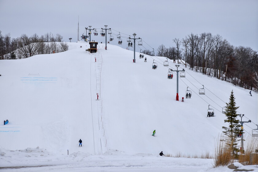 Chairlift and ski runs at Detroit Mountain on a winter day